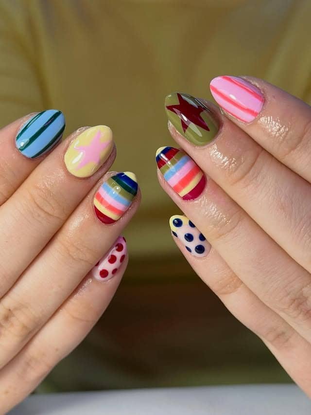 1. Colorful Mixed Pattern Almond Nails - april nail ideas