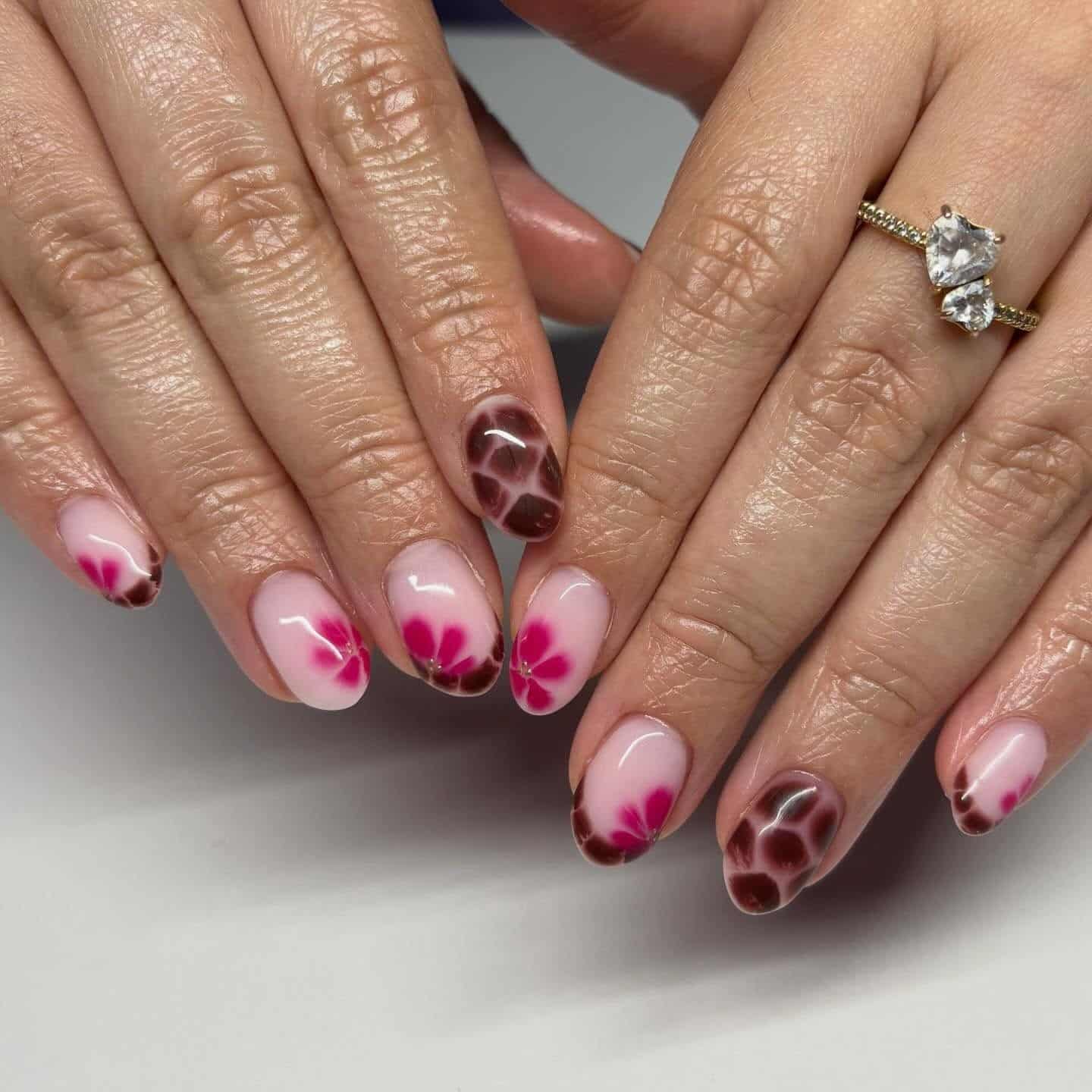 5. Pink Floral Chocolate Swirl Nails - april nail ideas