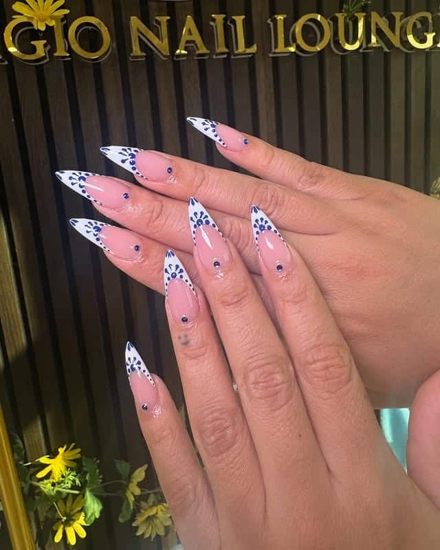 12. Blue Floral French Stiletto Nails - april nail ideas