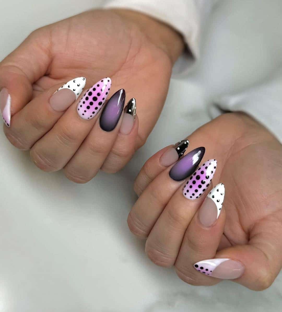 22. Lavender and Black Polka Dot Almond Nails - april nail ideas