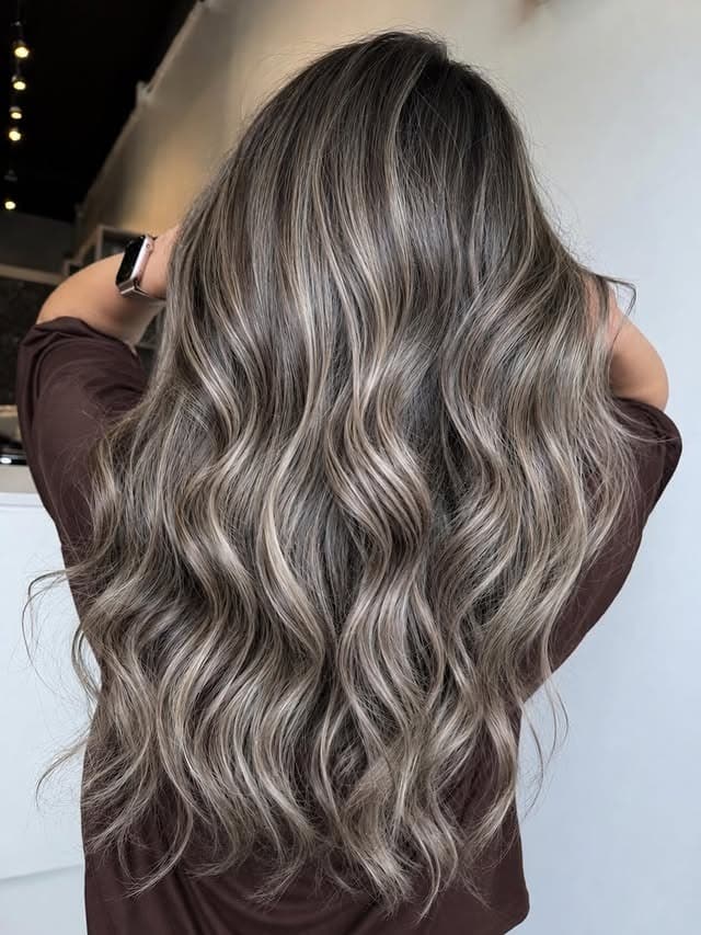 10. Voluminous Waves with Cool Beige Ash Brown Balayage - Ash Hair Color