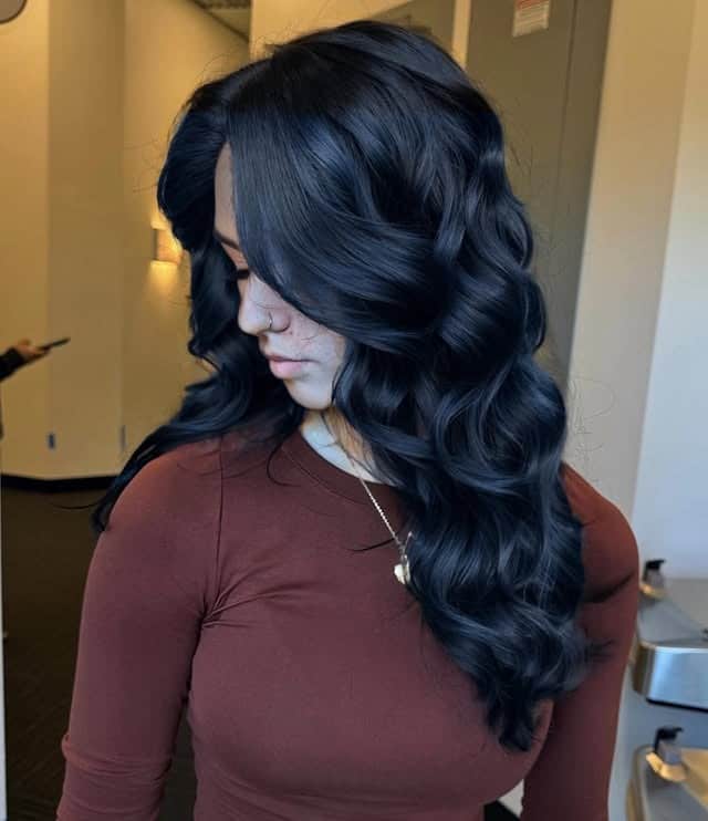 5. Soft Black Layered Blowout - Soft Black Hair Color