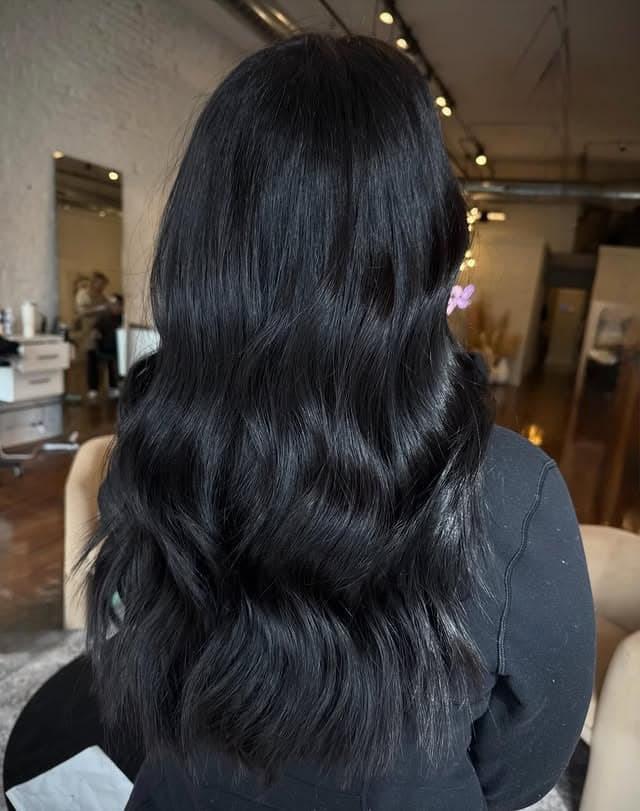 9. Soft Black Textured Loose Waves - Soft Black Hair Color