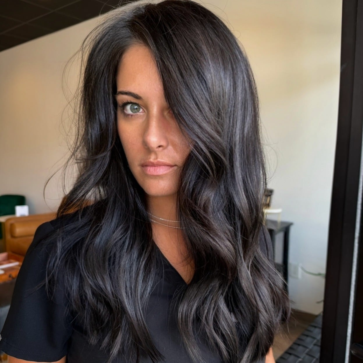 12. Soft Black Long Layers with Loose Waves - Soft Black Hair Color