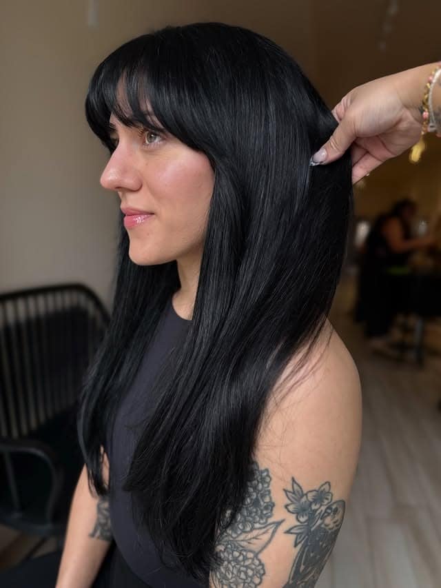 15. Soft Black Straight Hair with Wispy Bangs - Soft Black Hair Color