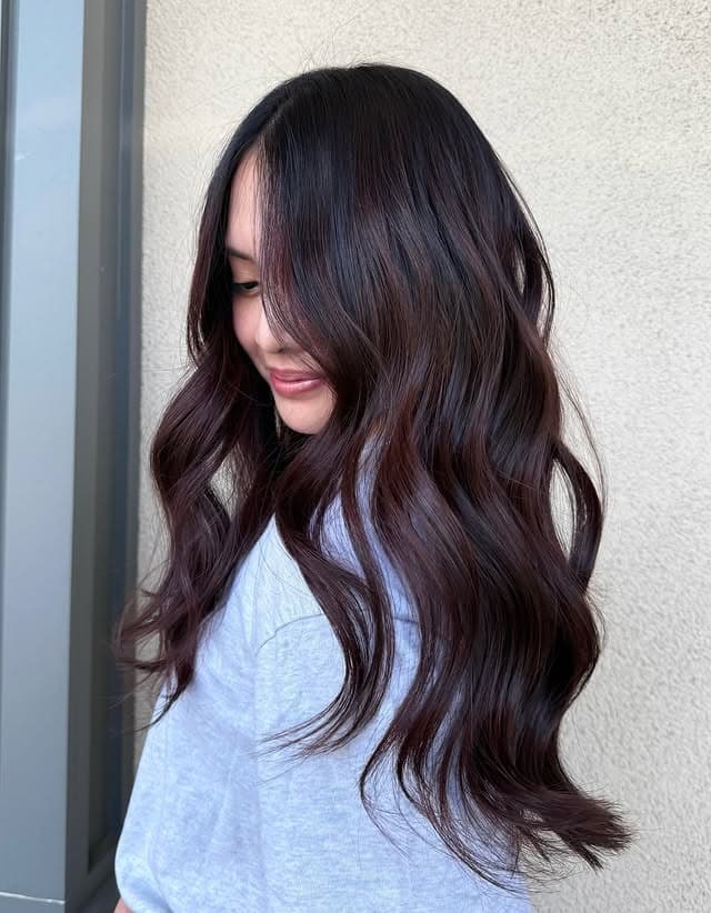 16. Soft Black Chocolate-Tinted Loose Waves - Soft Black Hair Color