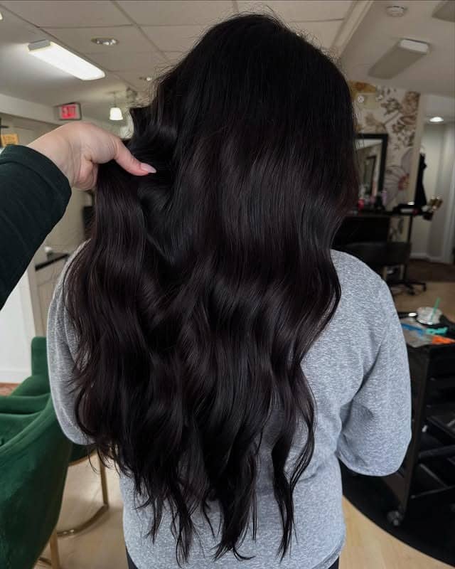 19. Soft Black Soft Waves with Long Layers - Soft Black Hair Color