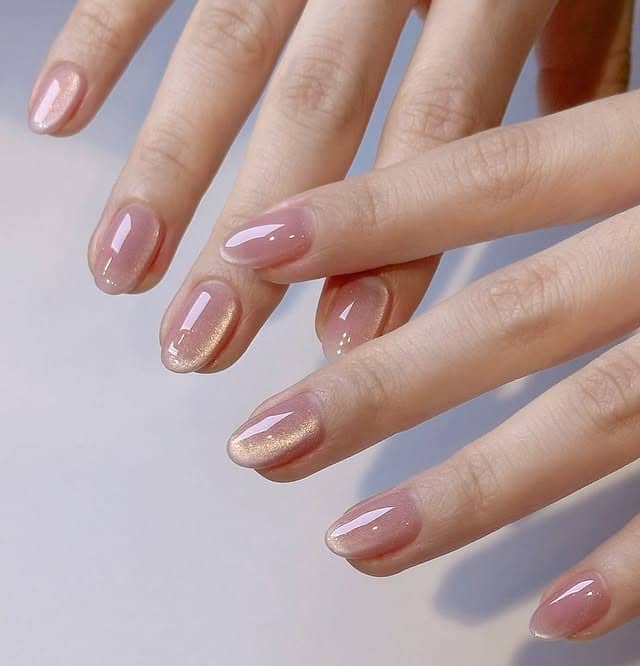 2. Sheer Rose Gold Shimmer Short Round Nails - awesome nail ideas