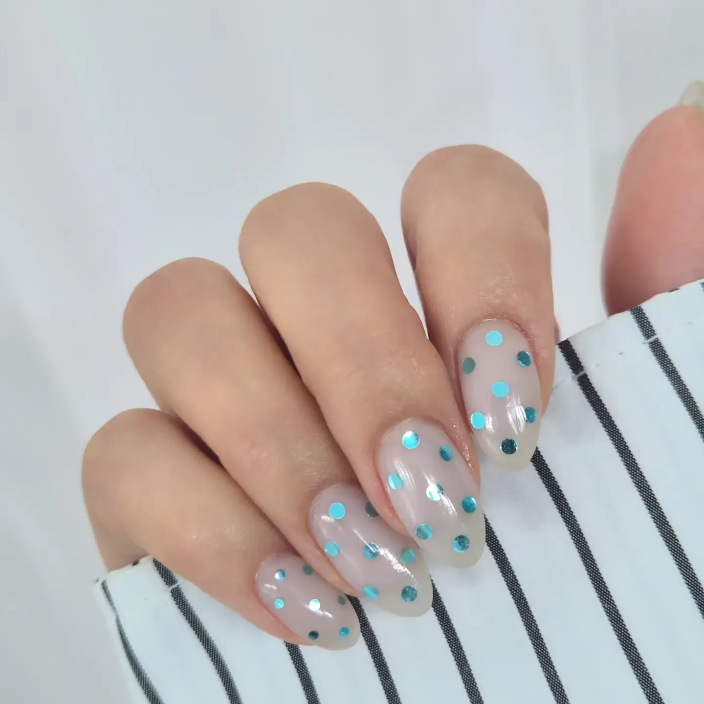 16. Nude Almond Nails with Turquoise Sequin Dots - awesome nail ideas