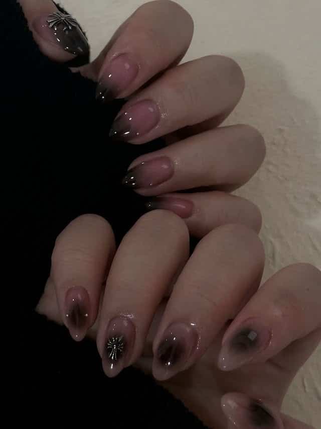 21. Smoky Black Aura Almond Nails with Silver Charms - awesome nail ideas