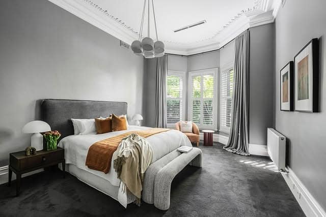 20. Classic Silver Gray Bedroom With Black and Caramel Accents - silver black bedroom ideas