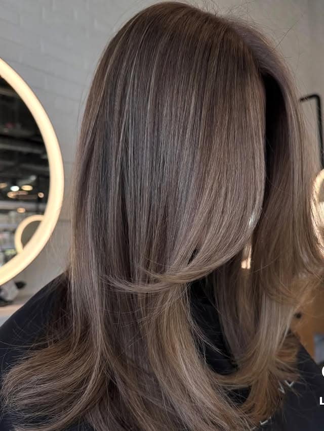 1. Smoky Mocha Bronde with Feathered Layers - Bronde Hair Color