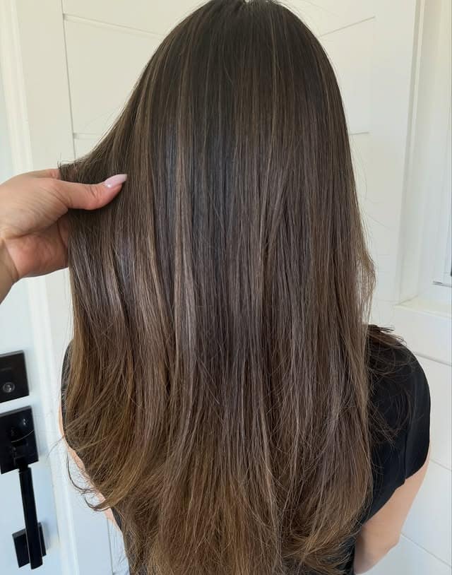 9. Cool Cocoa Bronde with Sleek Long Layers - Bronde Hair Color