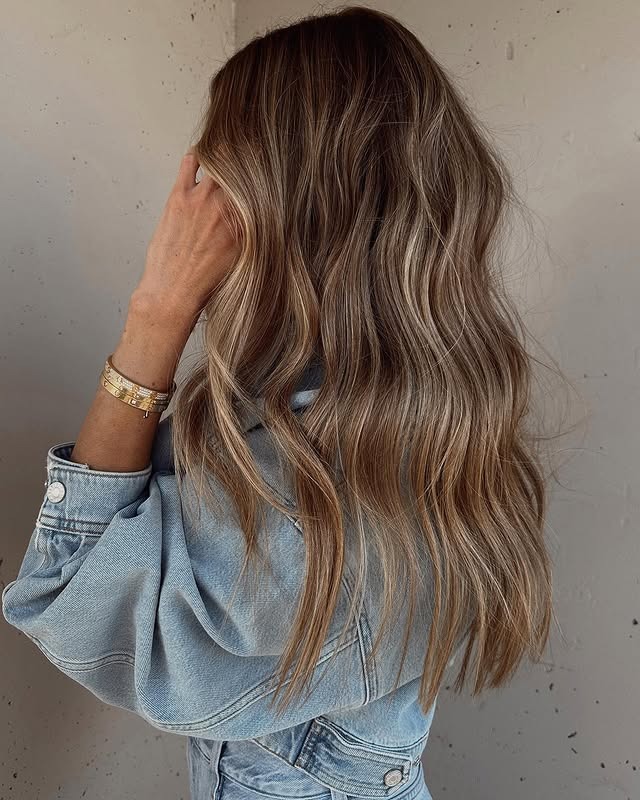 10. Sandy Bronde Balayage with Tousled Layers - Bronde Hair Color