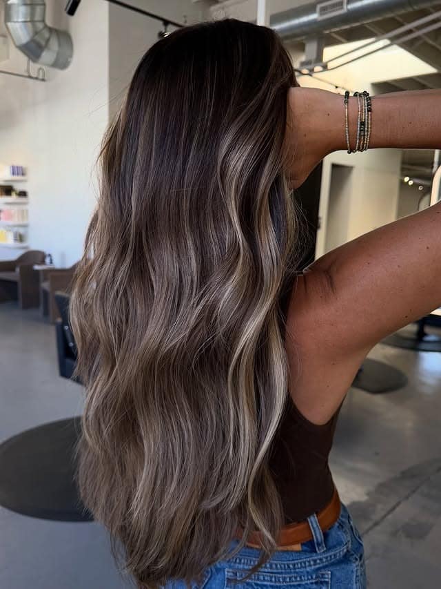 11. Smoky Ash Bronde with Extra-Long Waves - Bronde Hair Color