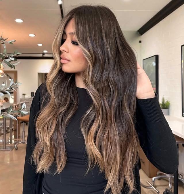 17. Caramel Bronde Balayage with Long Beachy Waves - Bronde Hair Color