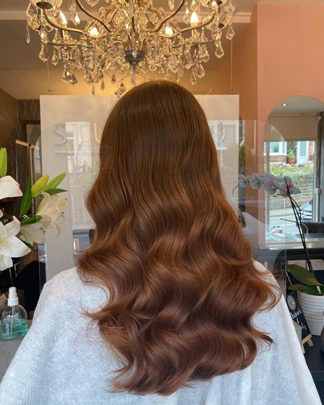 5. Cinnamon Chestnut Brown Glam Waves - Warm Brown Hair Color