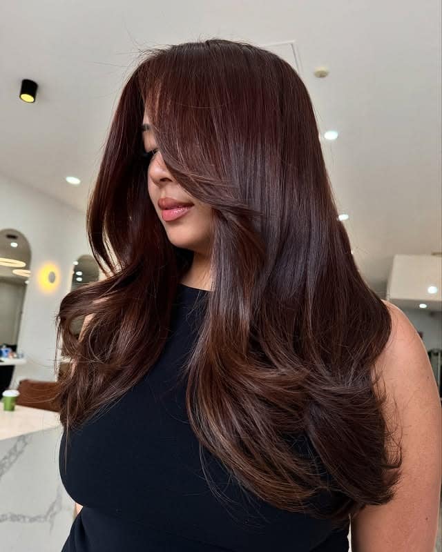 13. Mahogany Chocolate Brown Layered Blowout - Warm Brown Hair Color