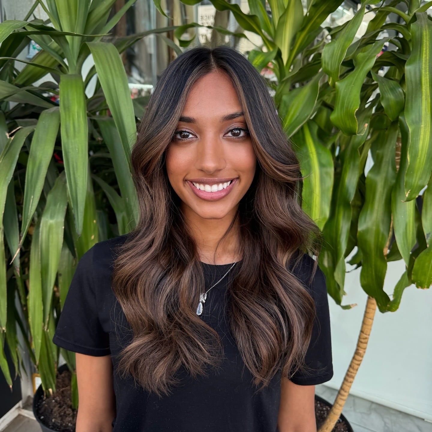 14. Mocha Brown Face-Framing Layered Waves - Warm Brown Hair Color