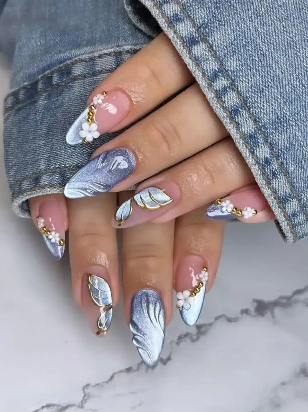 12. Icy Blue 3D Butterfly and Floral Nails - butterfly nail ideas