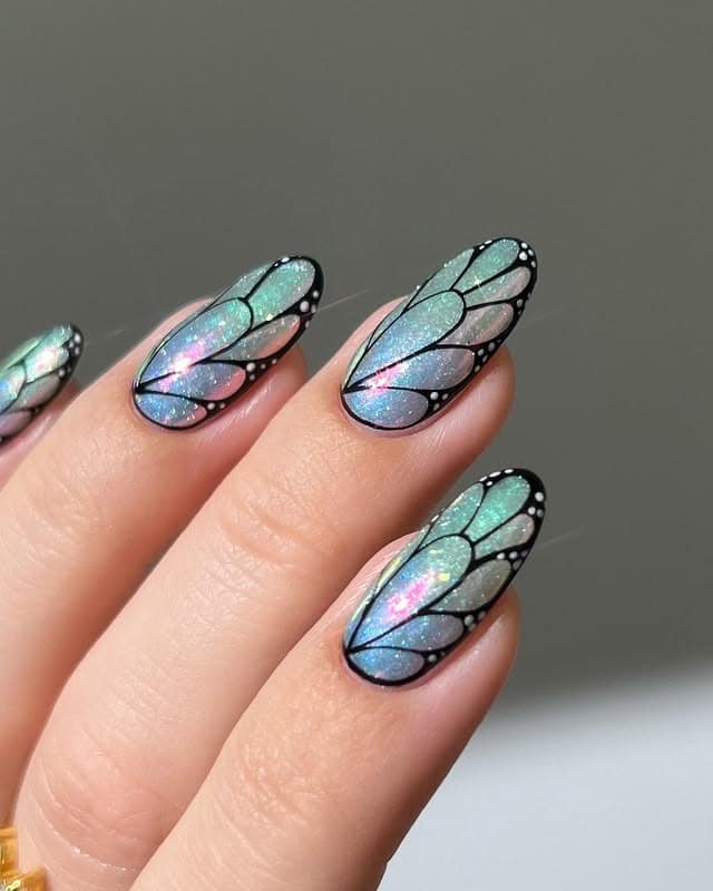 17. Opal Mint Iridescent Butterfly Wing Nails - butterfly nail ideas
