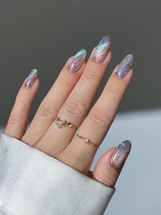 22. Iridescent Lavender Glass Butterfly Wing Nails - butterfly nail ideas