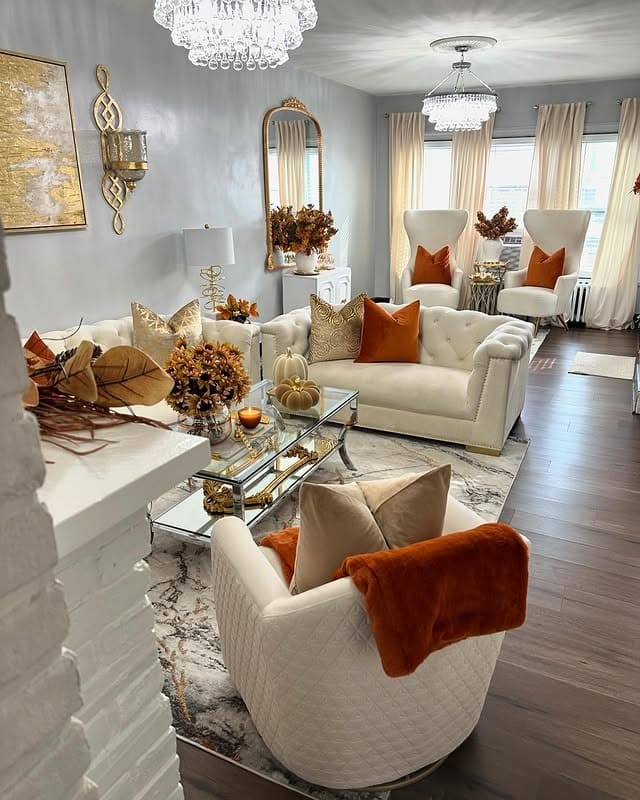 2. Burnt Orange and Ivory Glam Fall Living Room - fall living room ideas