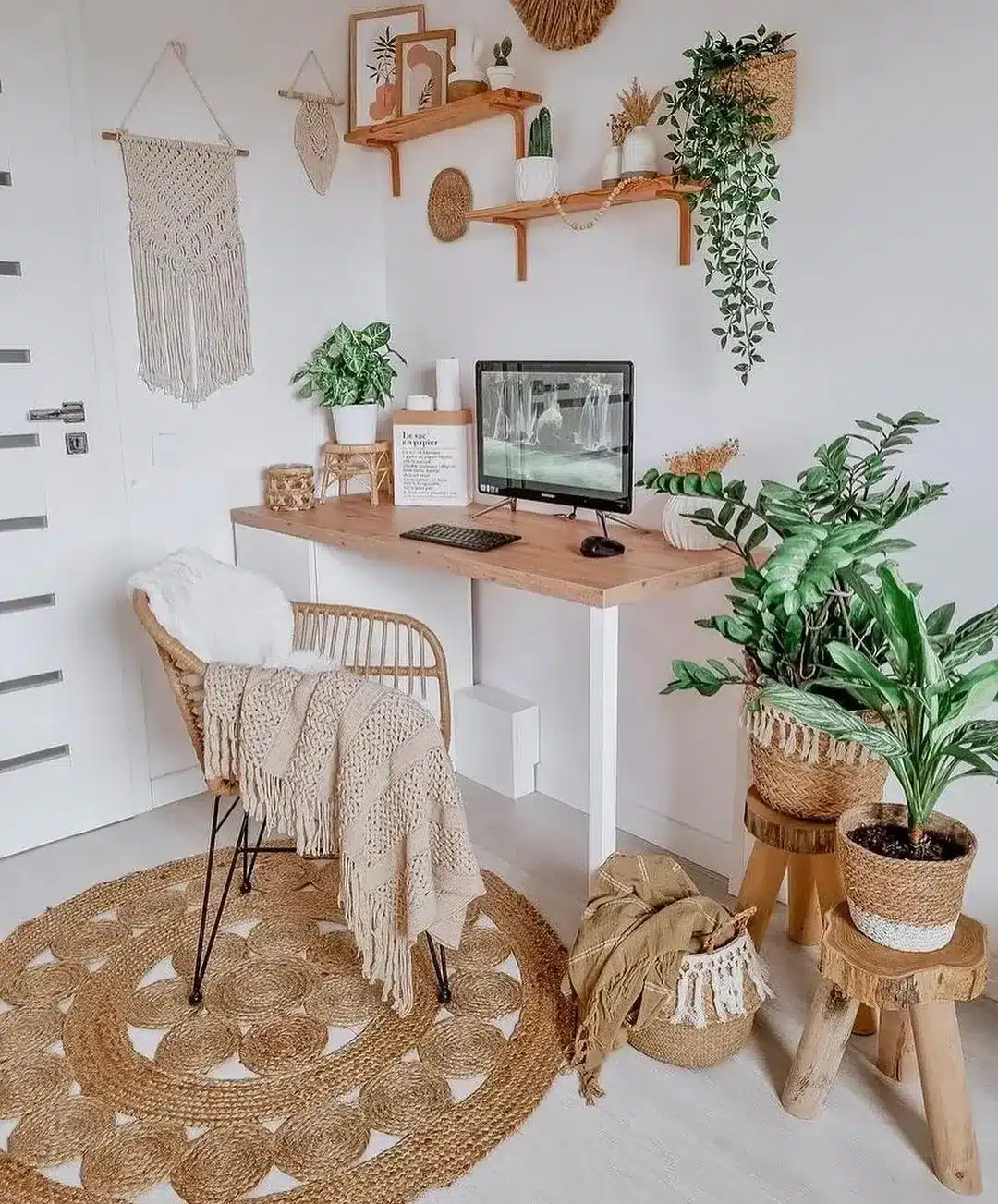 1. Natural Cream and Rattan Boho Office with Layered Greenery - boho office ideas