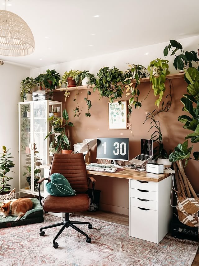 12. Clay Brown and Botanical Green Boho Office with Plant Shelf - boho office ideas