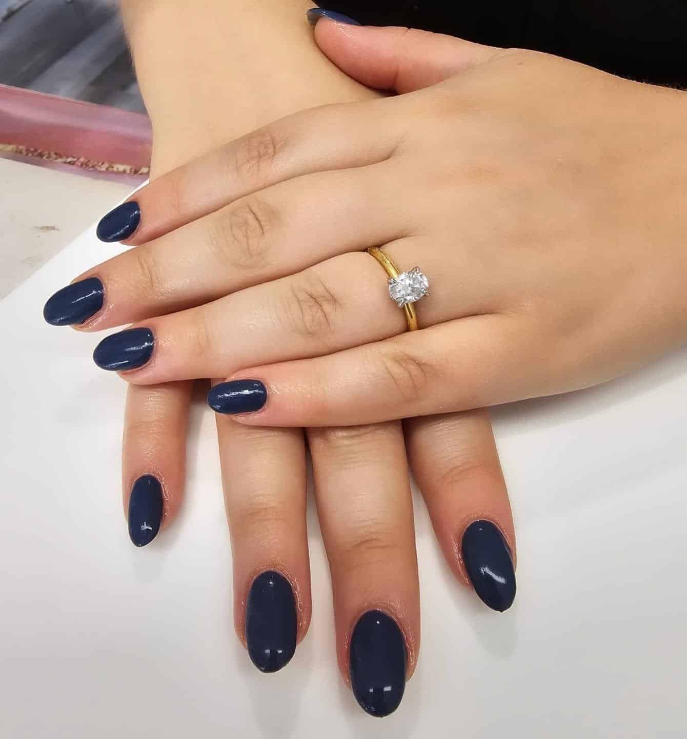 5. Classic Navy Blue Oval Nails - dark blue nail ideas