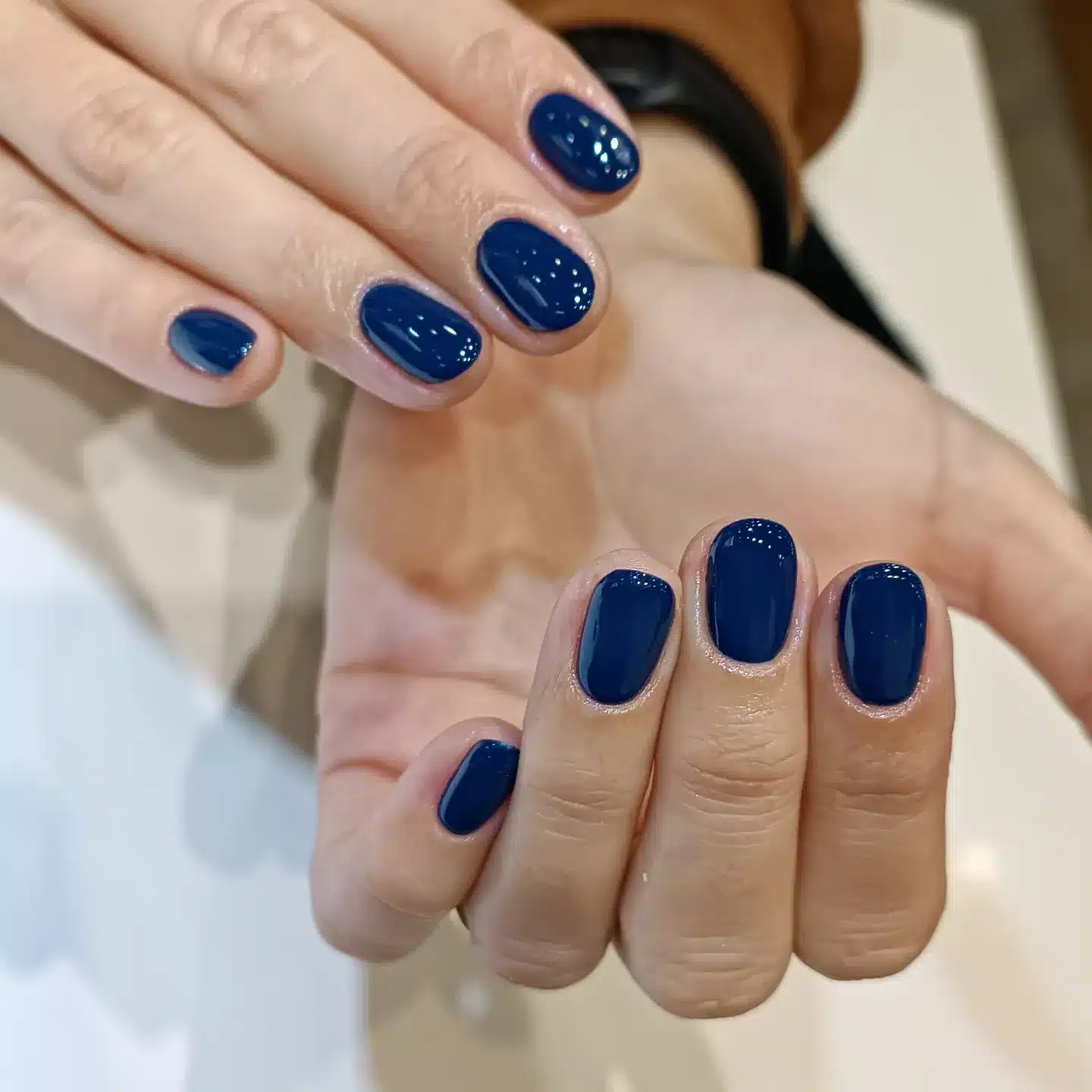 6. Royal Navy Short Rounded Nails - dark blue nail ideas