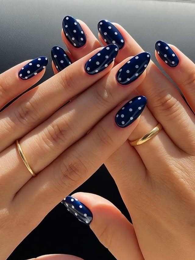 9. Navy Blue Polka Dot Almond Nails - dark blue nail ideas