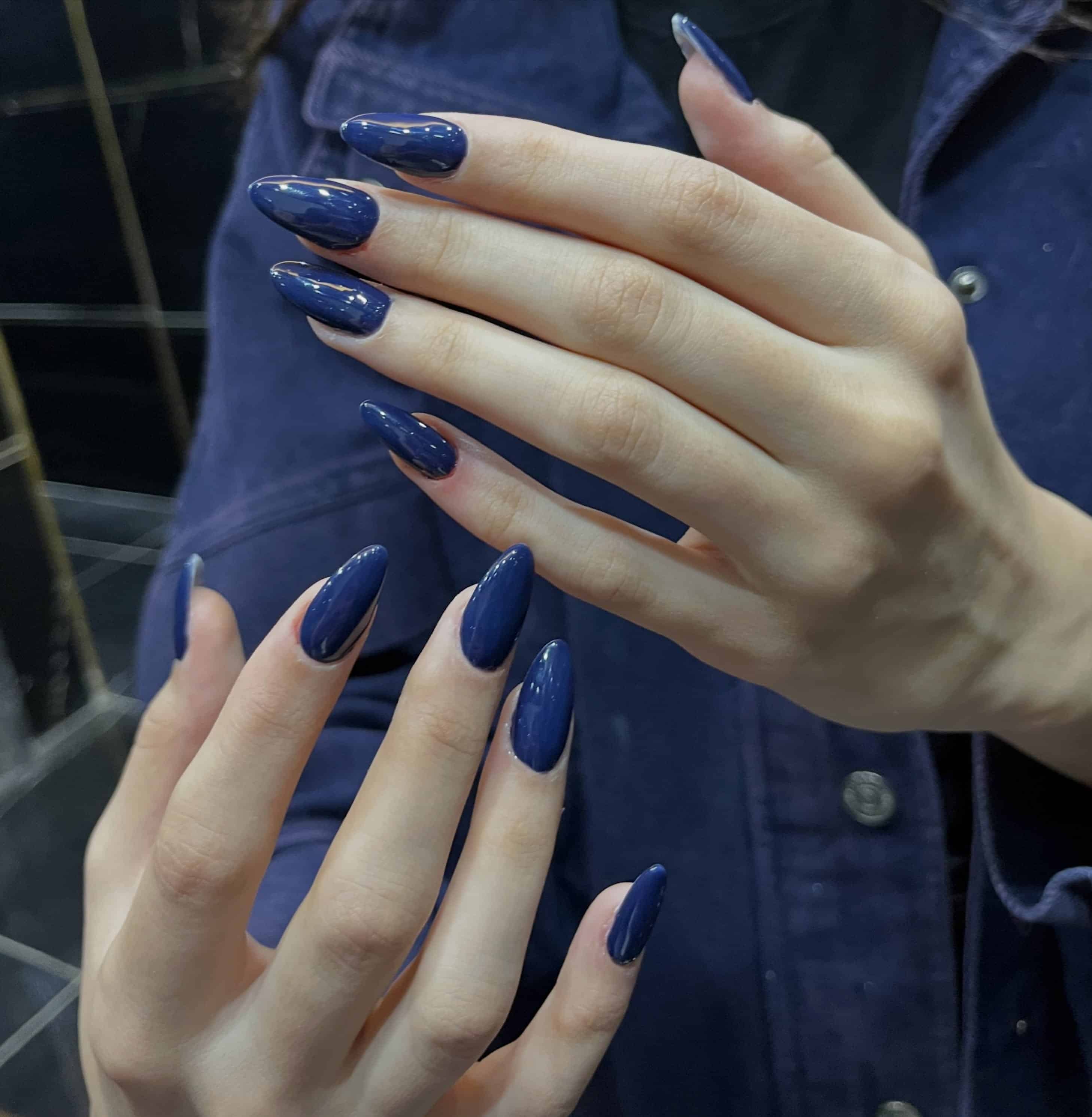 14. Smoky Indigo Almond Nails - dark blue nail ideas