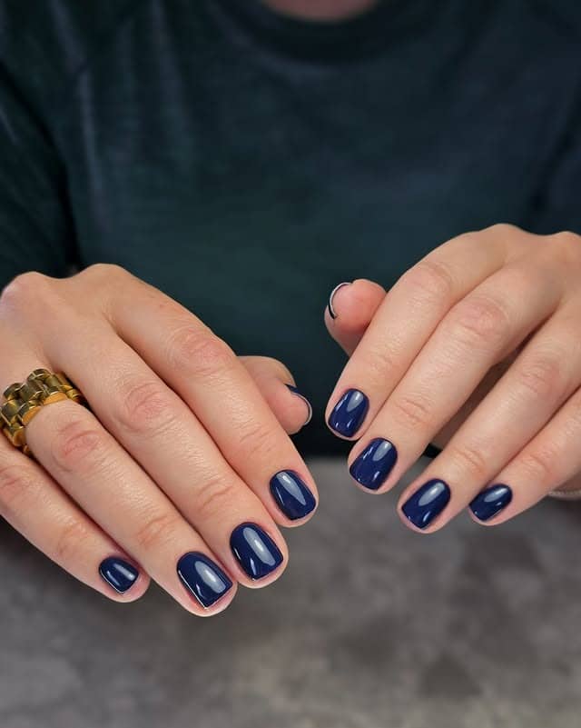 16. Glossy Sapphire Blue Short Squoval Nails - dark blue nail ideas