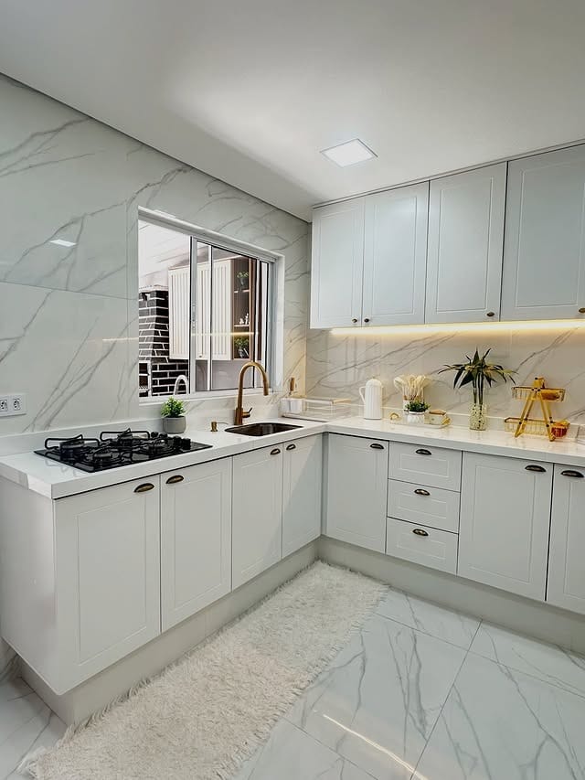 5. White Shaker Cabinets with Marble and Antique Brass - white cabinets kitchen ideas