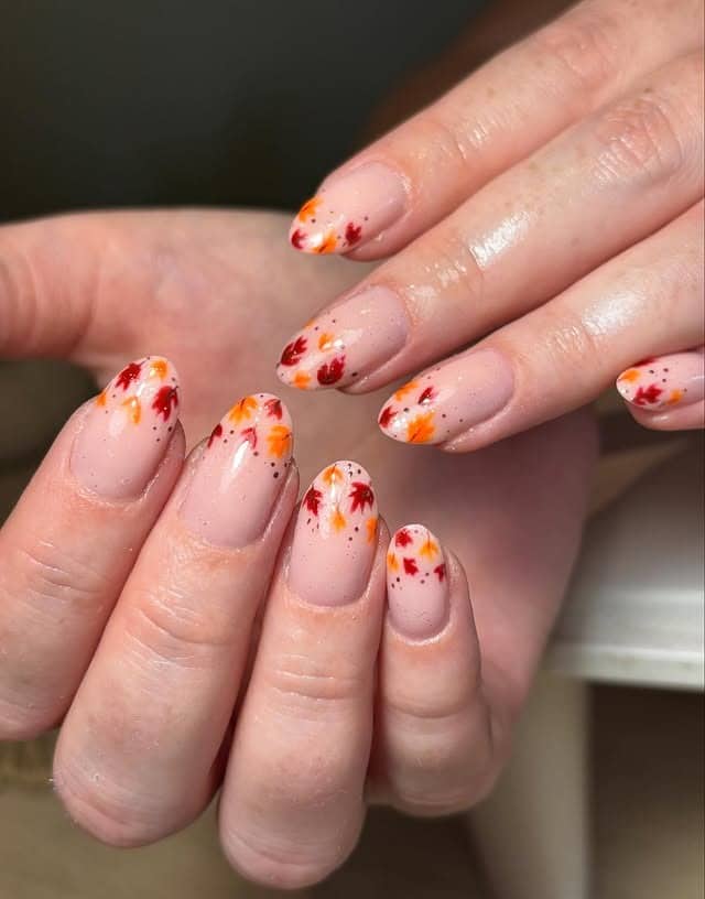2. Red and Orange Falling Leaf Almond Nails - fall leaf nail ideas