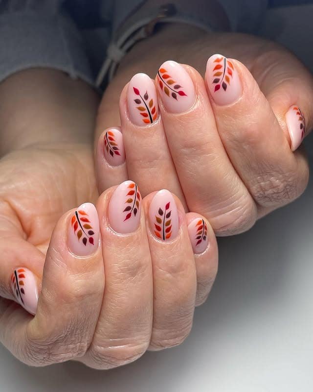 20. Orange and Burgundy Leaf Branch Short Nails - fall leaf nail ideas