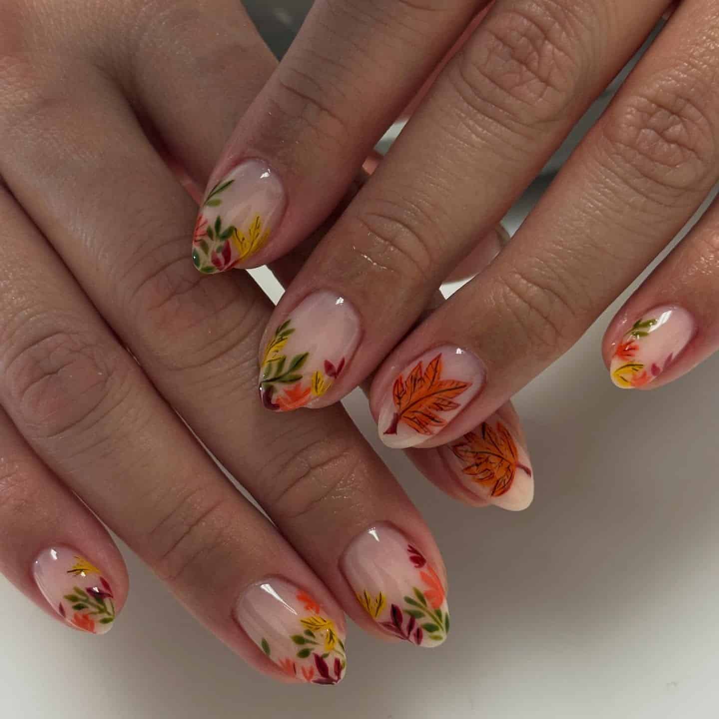 21. Colorful Autumn Botanical Short Oval Nails - fall leaf nail ideas
