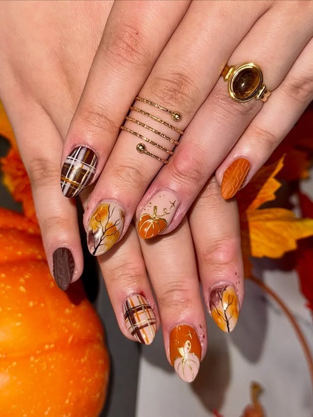 22. Pumpkin Orange Plaid and Fall Leaf Almond Nails - fall leaf nail ideas