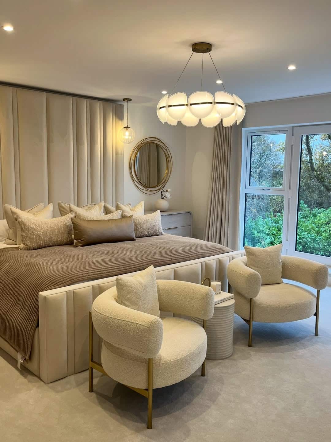 10. Warm Greige Bedroom with Cream Boucle Seating - elegant bedroom ideas