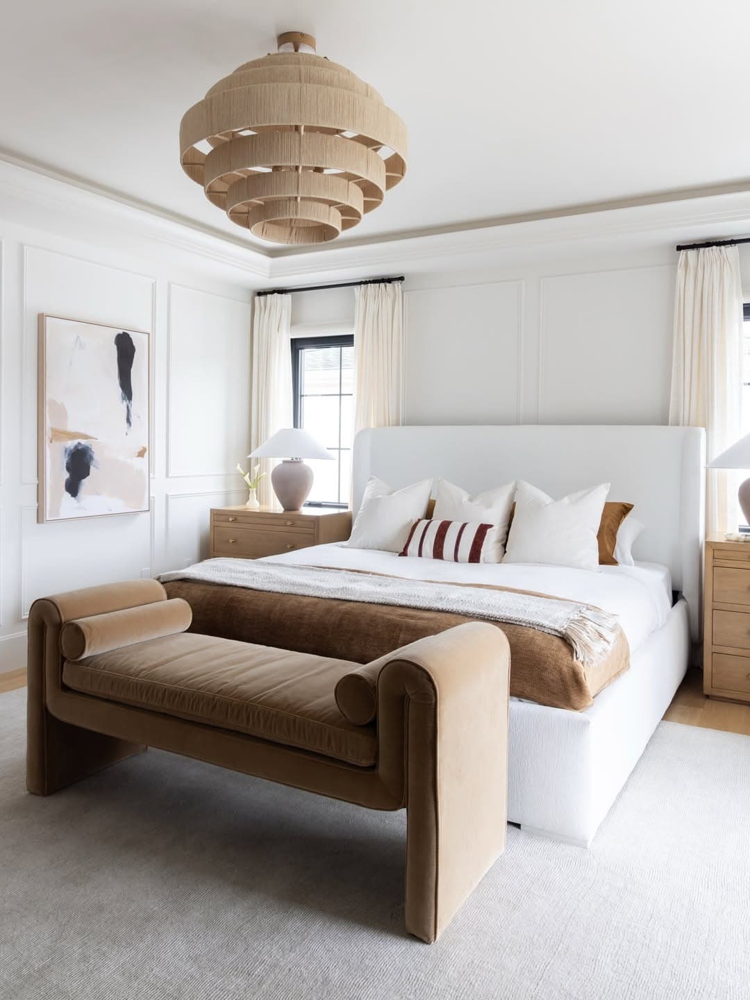 15. Crisp White and Caramel Bedroom with Sculptural Furniture - elegant bedroom ideas