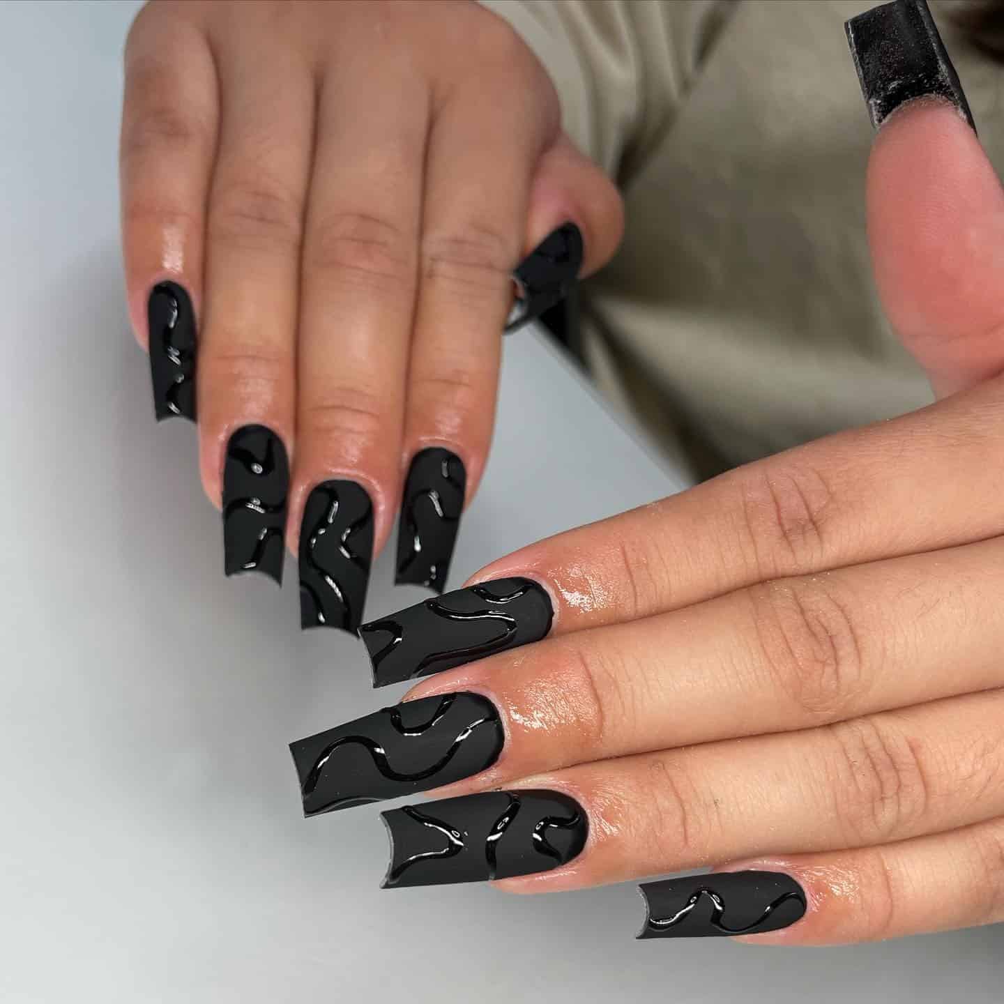 3. Matte Black Glossy Swirl Coffin Nails - matte black nail ideas
