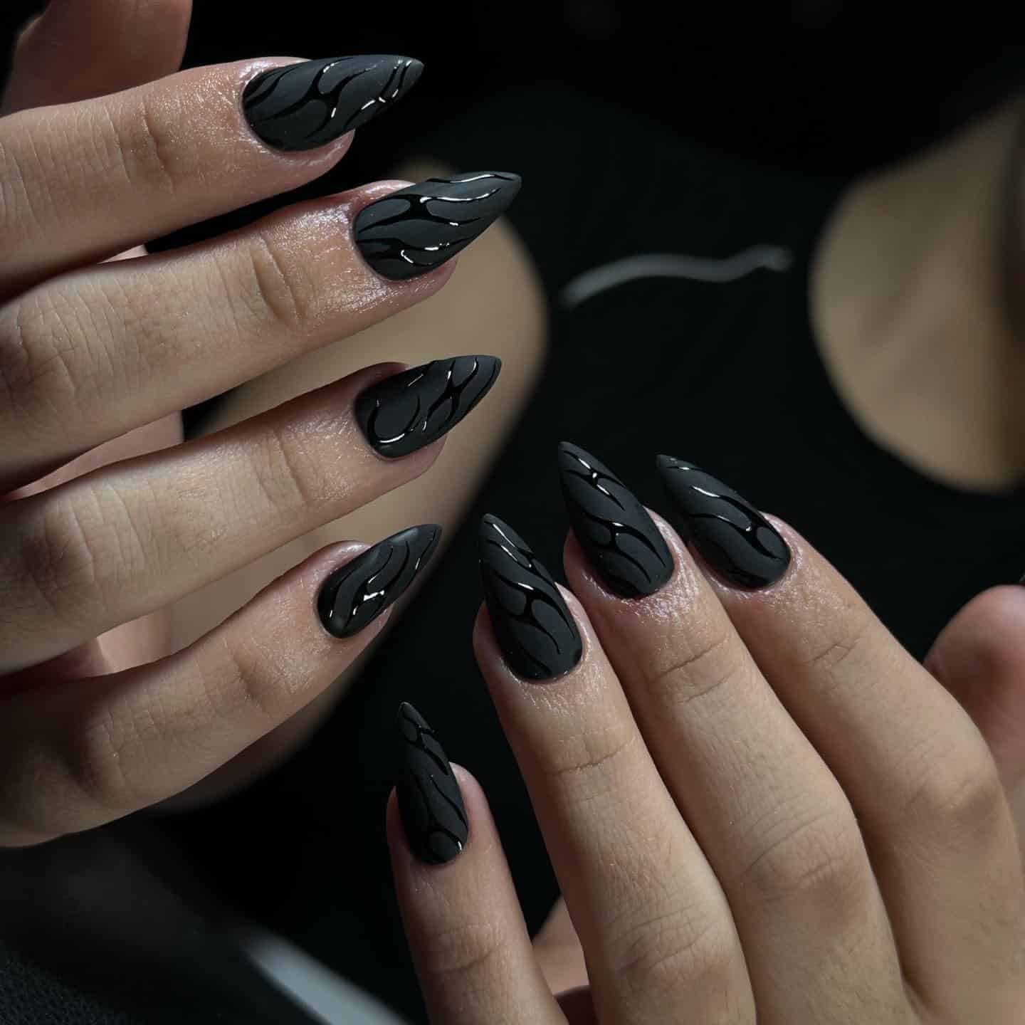 12. Matte Black Almond Nails with Glossy Abstract Lines - matte black nail ideas