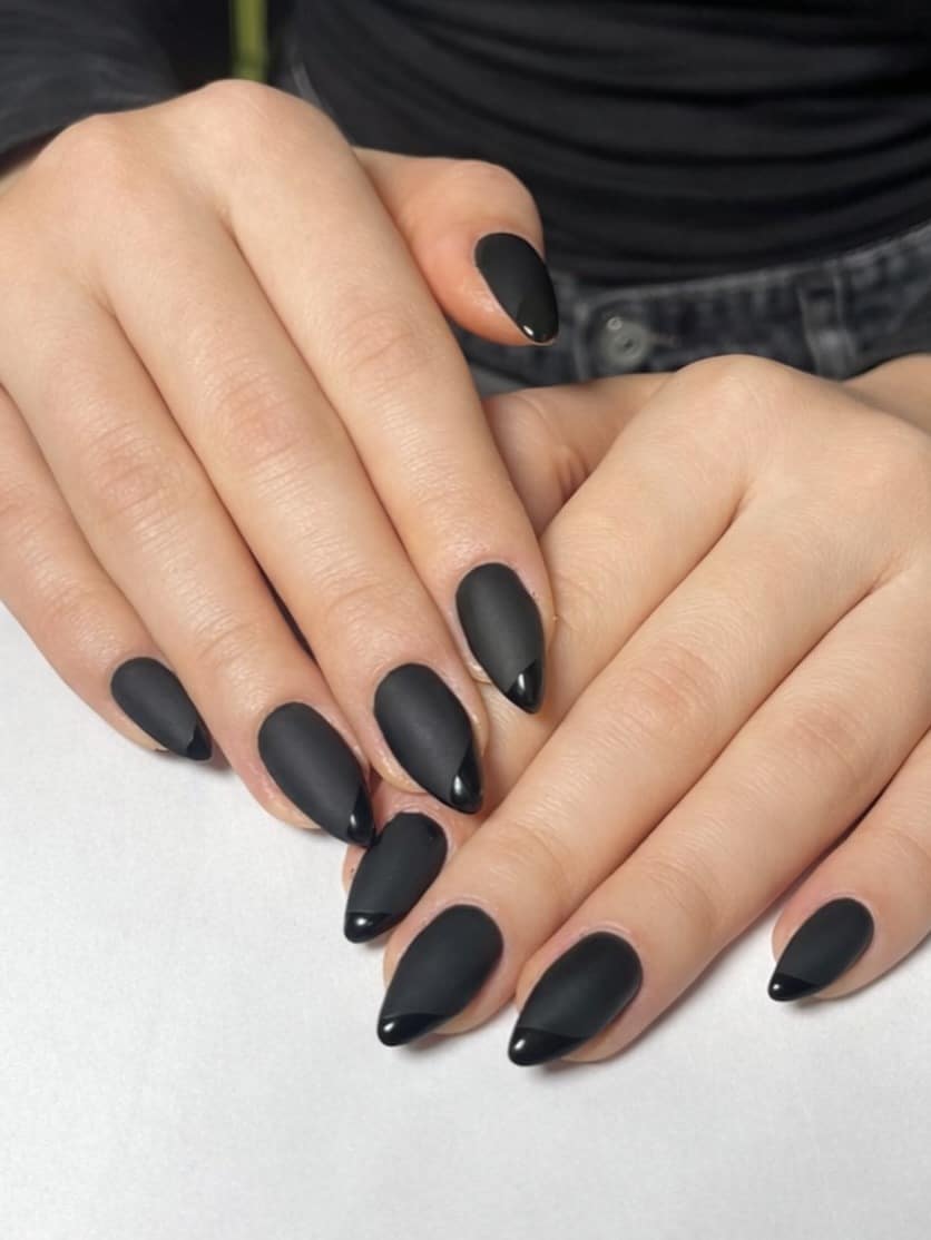 14. Matte Black Almond Nails with Glossy French Tips - matte black nail ideas