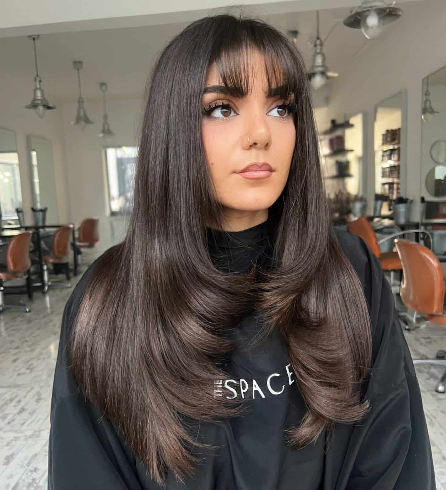 2. Espresso Brown Sleek Layers with Full Fringe - Fringe Hairstyles