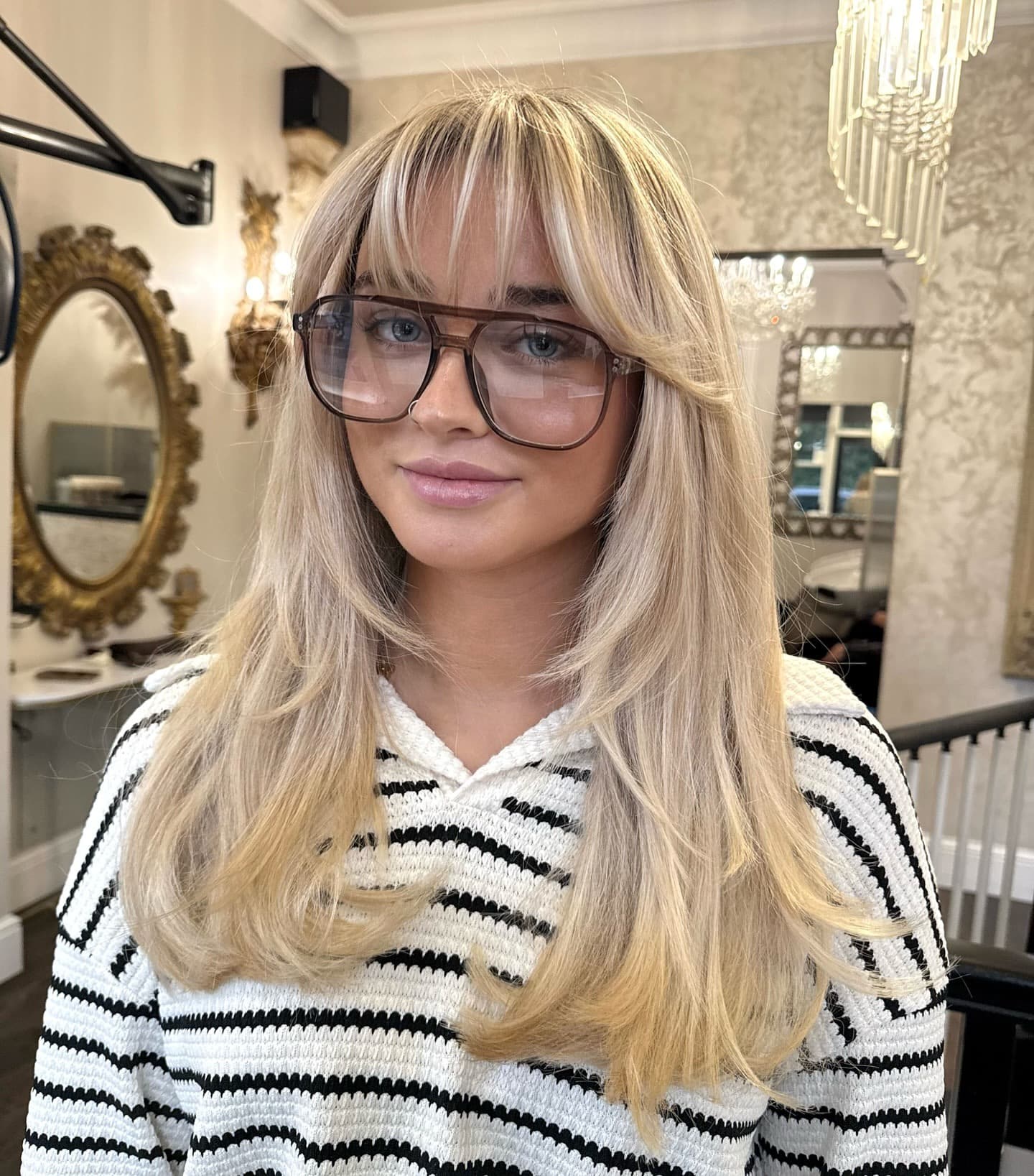 21. Champagne Blonde Layers with Feathered Fringe - Fringe Hairstyles