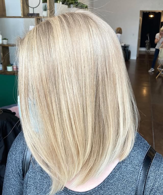 8. Creamy Champagne Blonde Angled Lob - Angled Bob Hairstyles