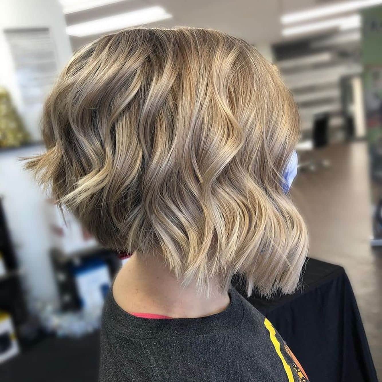 11. Wavy Beige Blonde Angled Bob - Angled Bob Hairstyles
