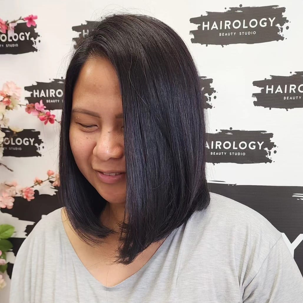 17. Soft Black Asymmetrical Angled Bob - Angled Bob Hairstyles