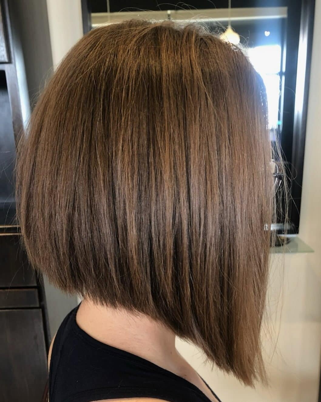 21. Chocolate Brown Sleek Angled Bob - Angled Bob Hairstyles